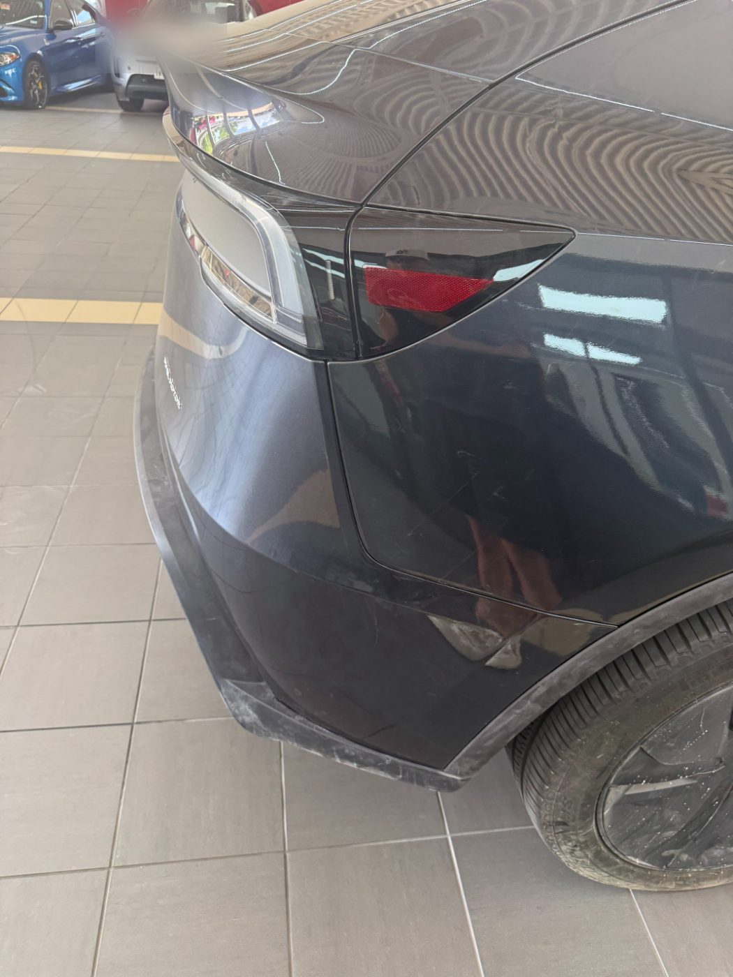 Tesla Model Y after panel repair at our Plano shop.