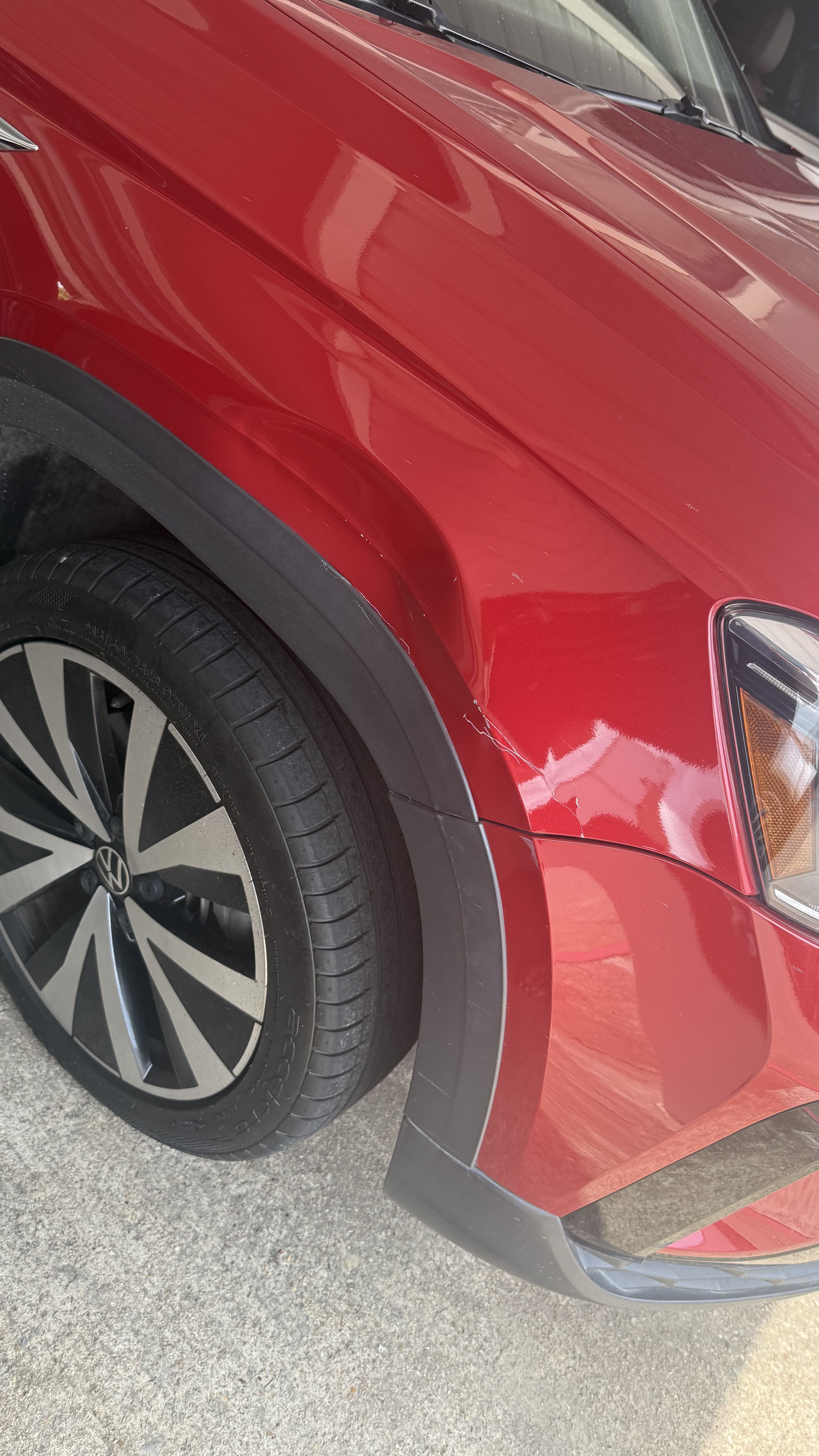 Volkswagen Taos front fender with a crease at the wheel arch