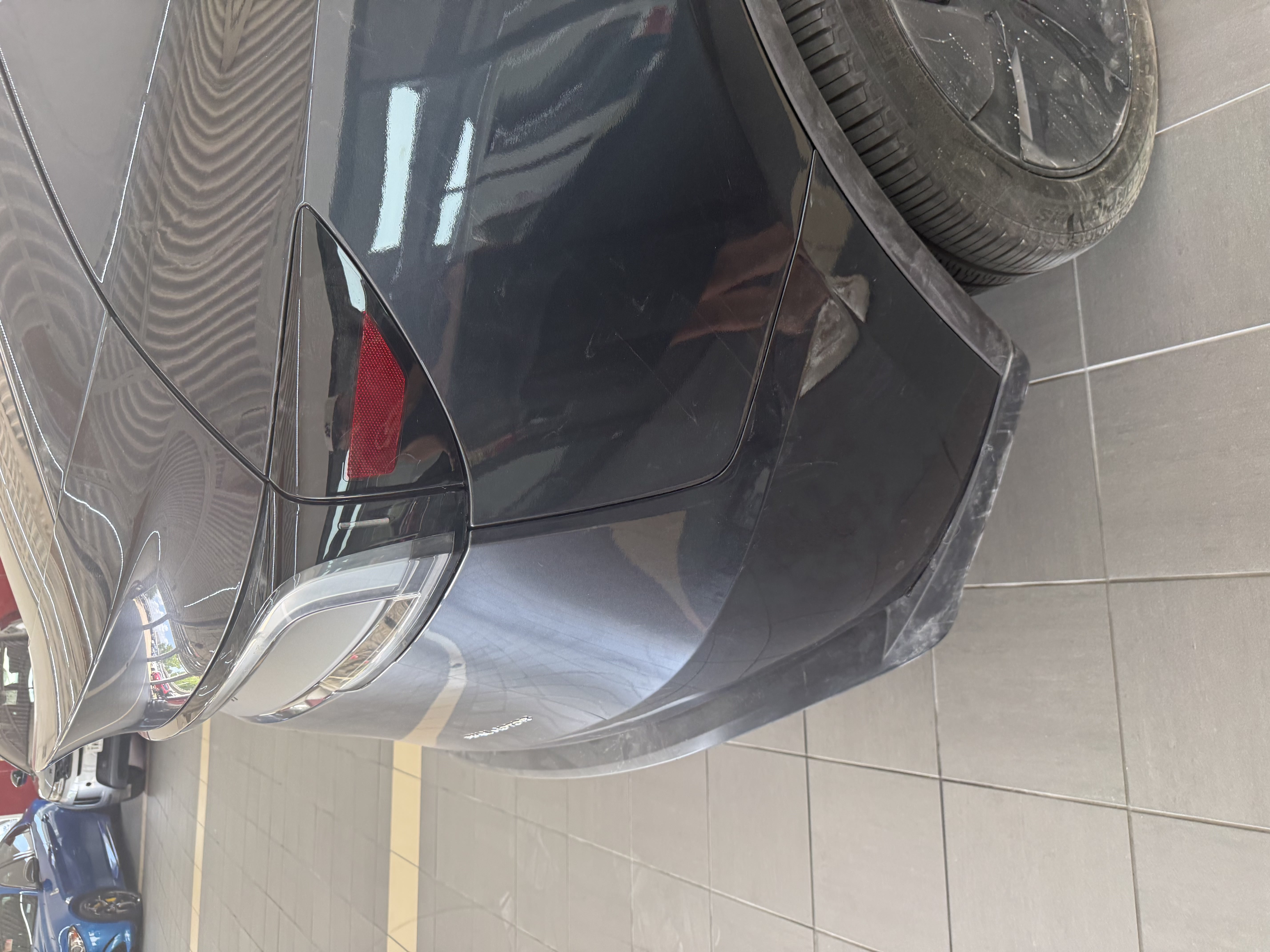 Tesla Model Y rear quarter repaired and refinished