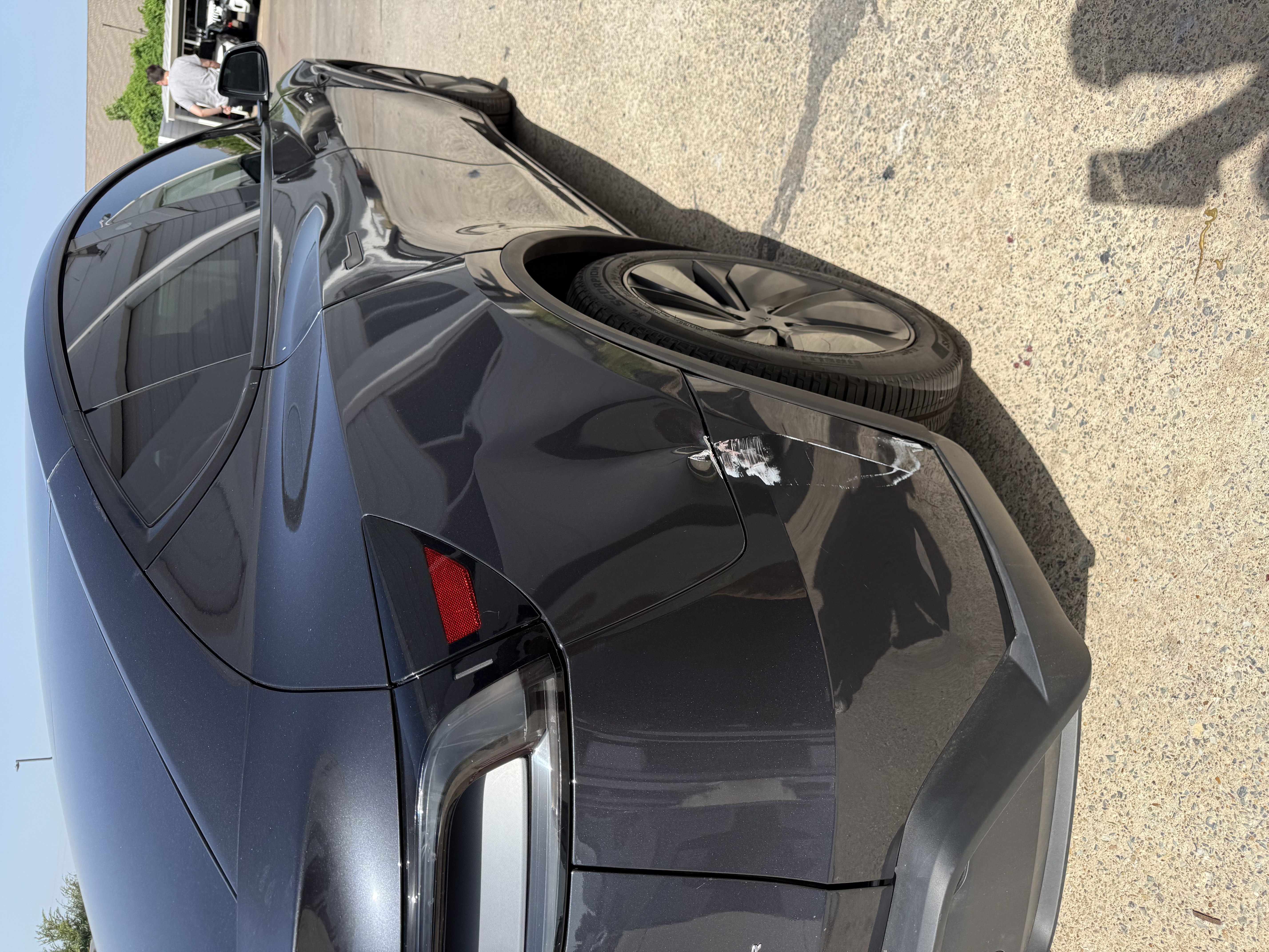 Tesla Model Y rear quarter gouged at the wheel arch