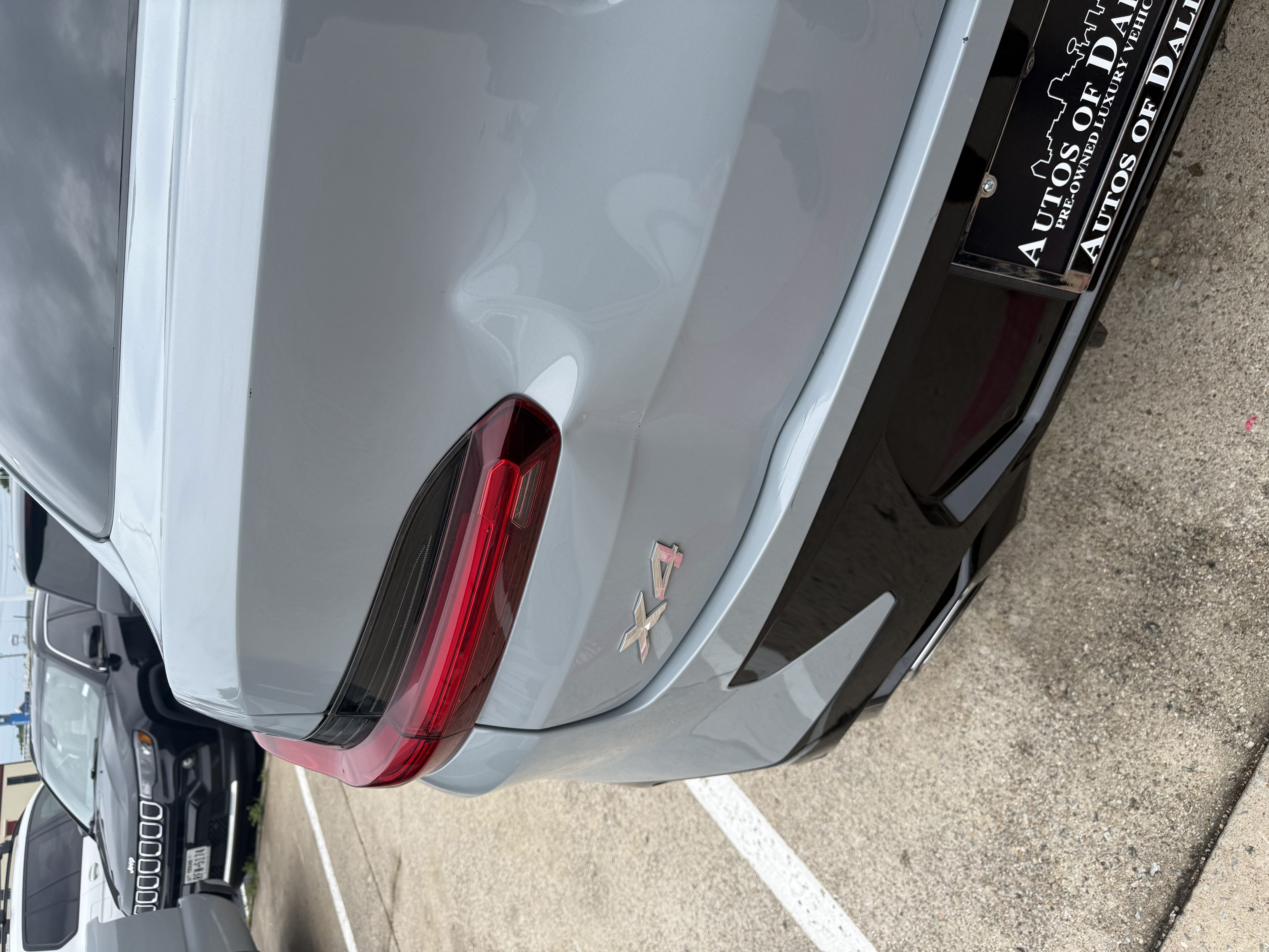 BMW X4 rear quarter with a crease above the bumper